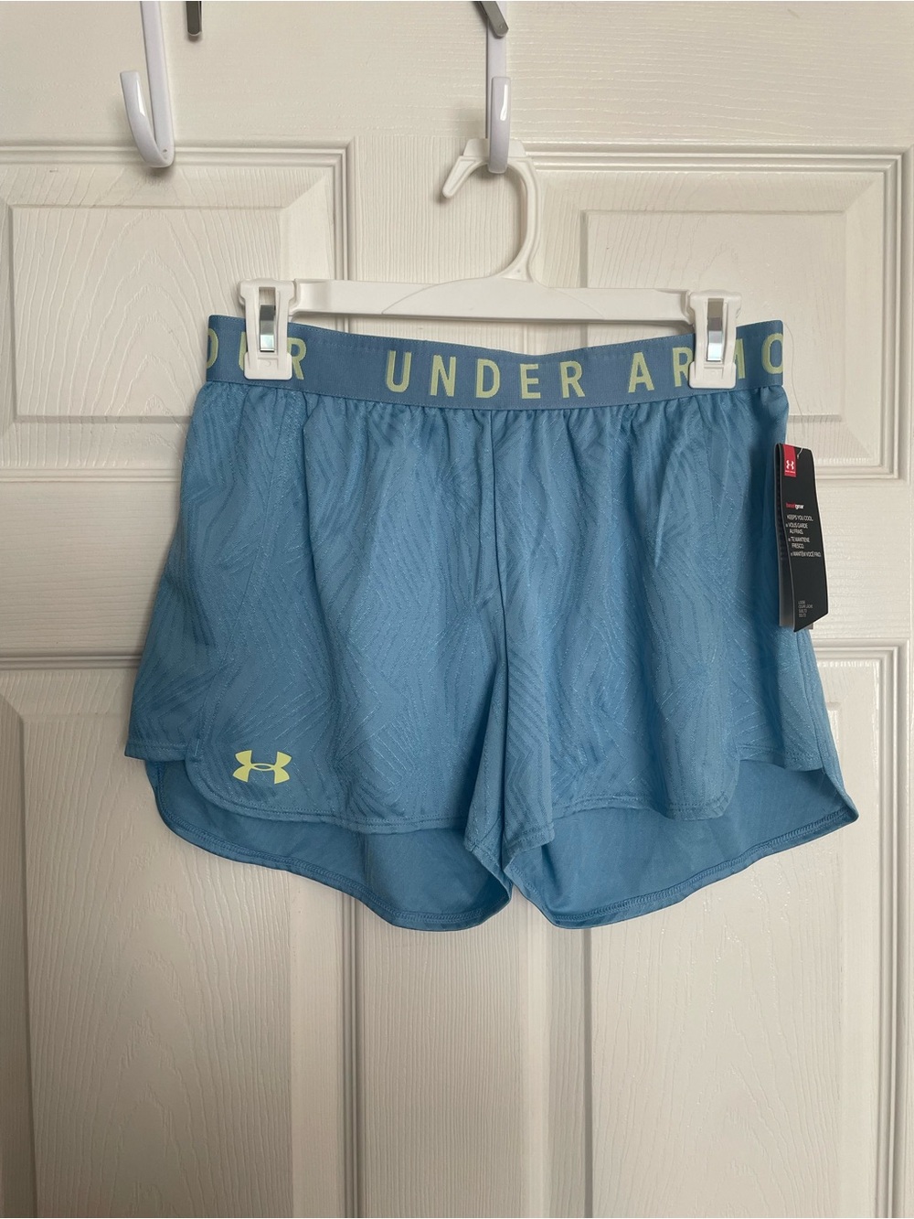NWT Under Armour Women's size Small Light Blue and Yellow Athletic Shorts - Picture 1 of 7